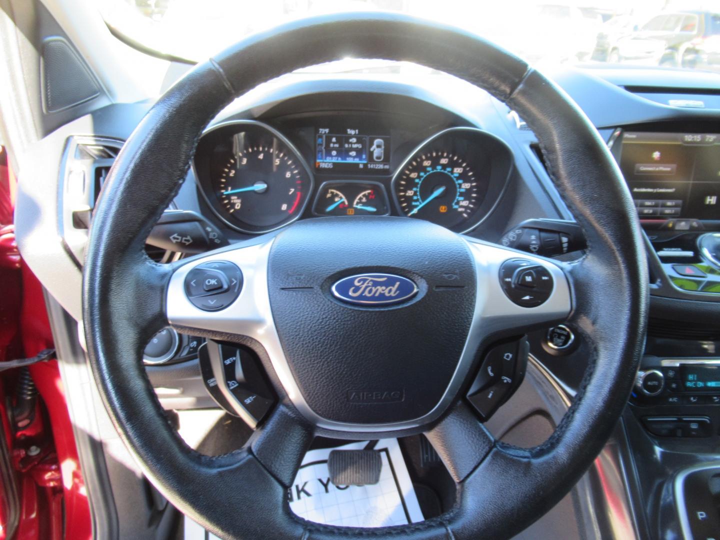 2014 Red /Black Ford Escape Titanium (1FMCU0J98EU) with an 2.0 engine, Automatic transmission, located at 1511 North Shepherd Dr., Houston, TX, 77008, (281) 657-1221, 29.798361, -95.412560 - 2014 FORD ESCAPE TITANIUM VIN: 1FMCU0J98EUA29272 1 F M C U 0 J 9 8 E U A 2 9 2 7 2 4 DOOR WAGON/SPORT UTILITY 2.0L I4 F DOHC 16V GASOLINE FRONT WHEEL DRIVE - Photo#3